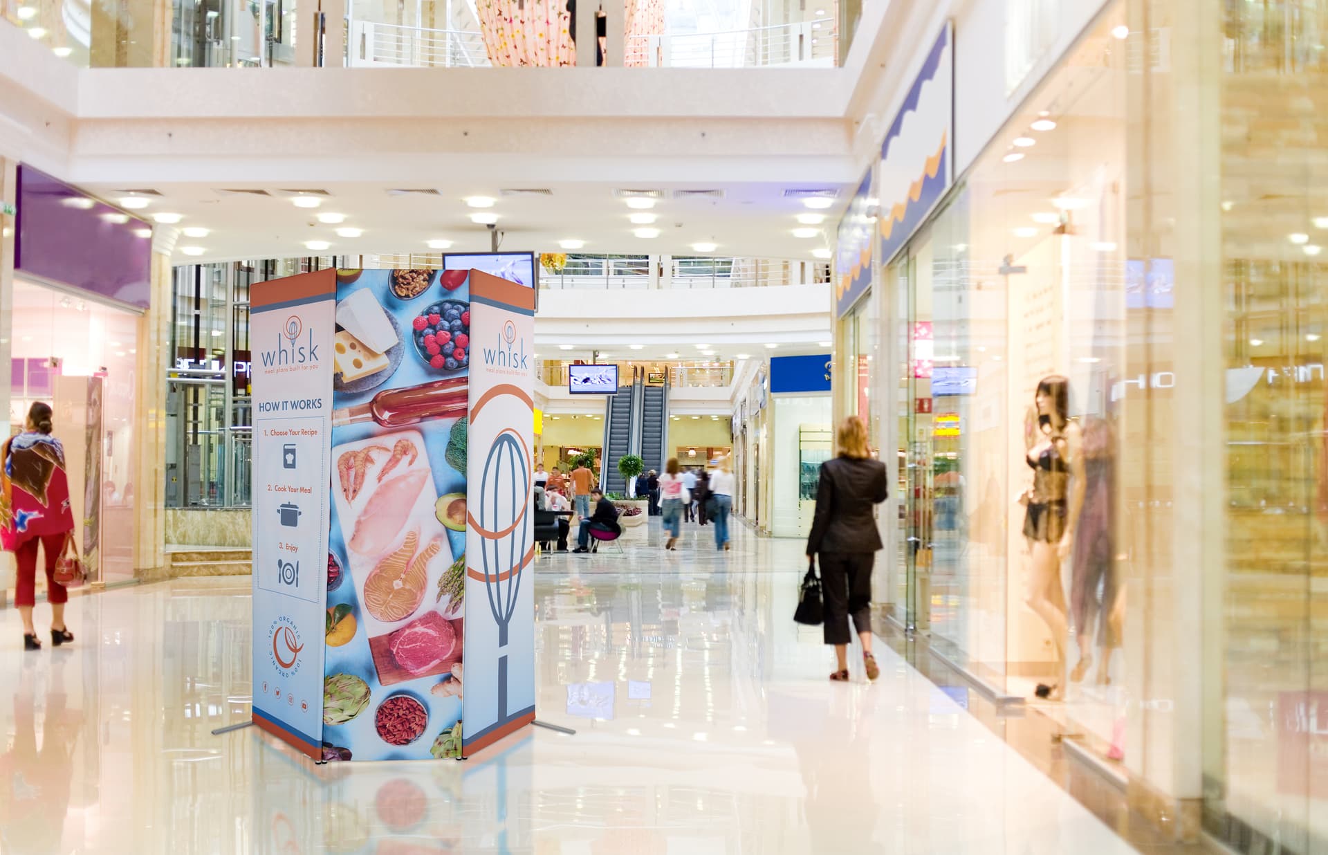 Fabric banner display stand with tight fitting graphics