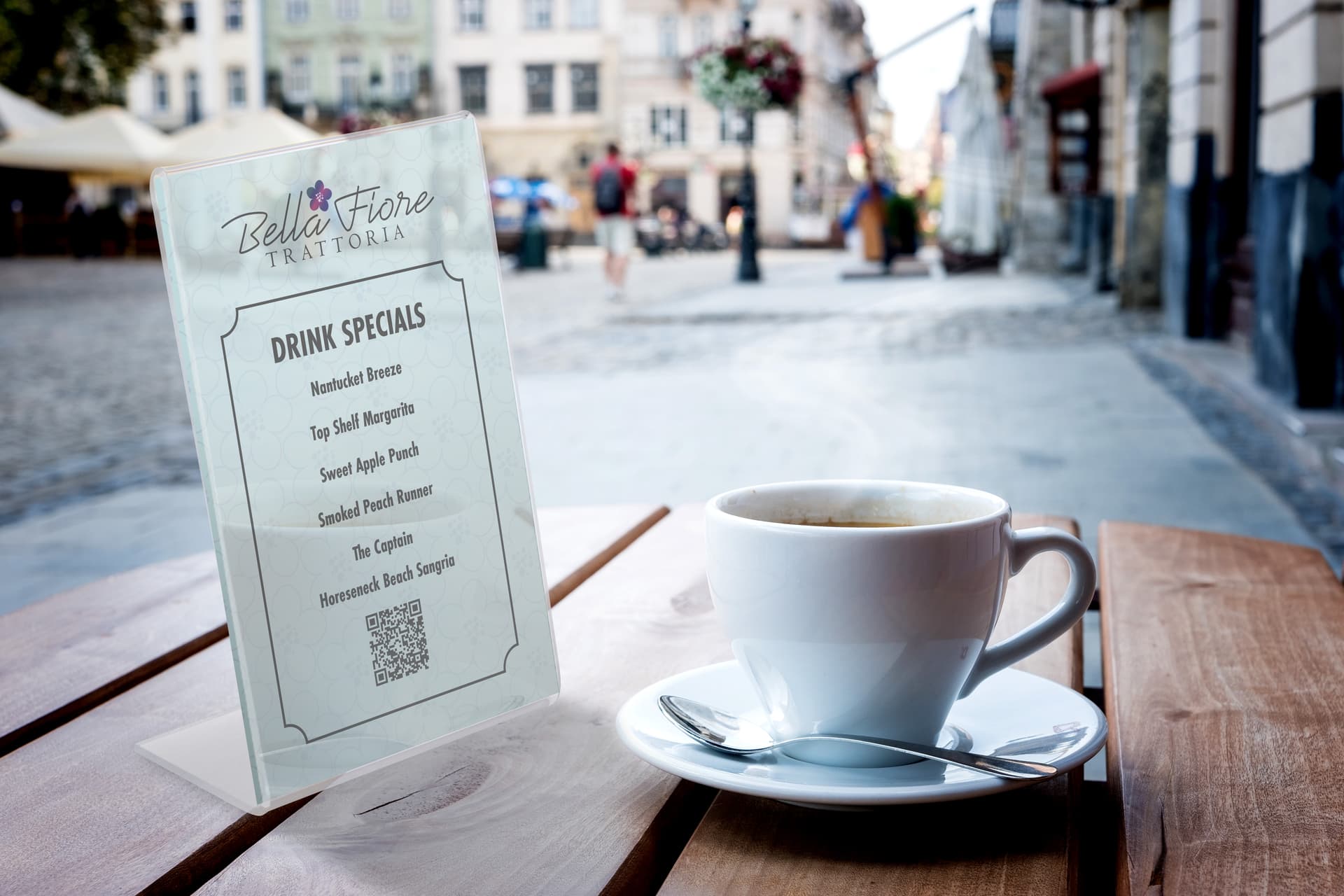Table sign holder with menu on sidewalk cafe table