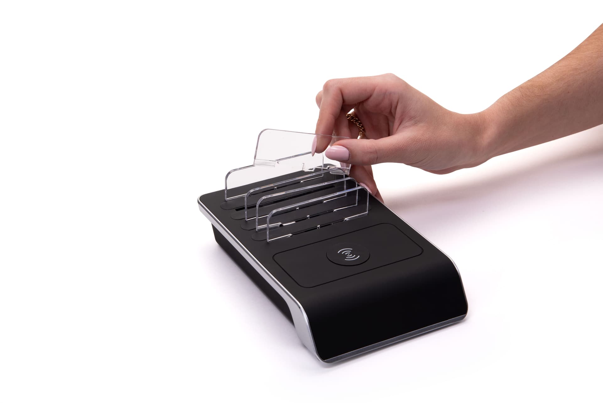 4 port USB charger dock with wireless pad features removable acrylic dividers to fit different size devices 