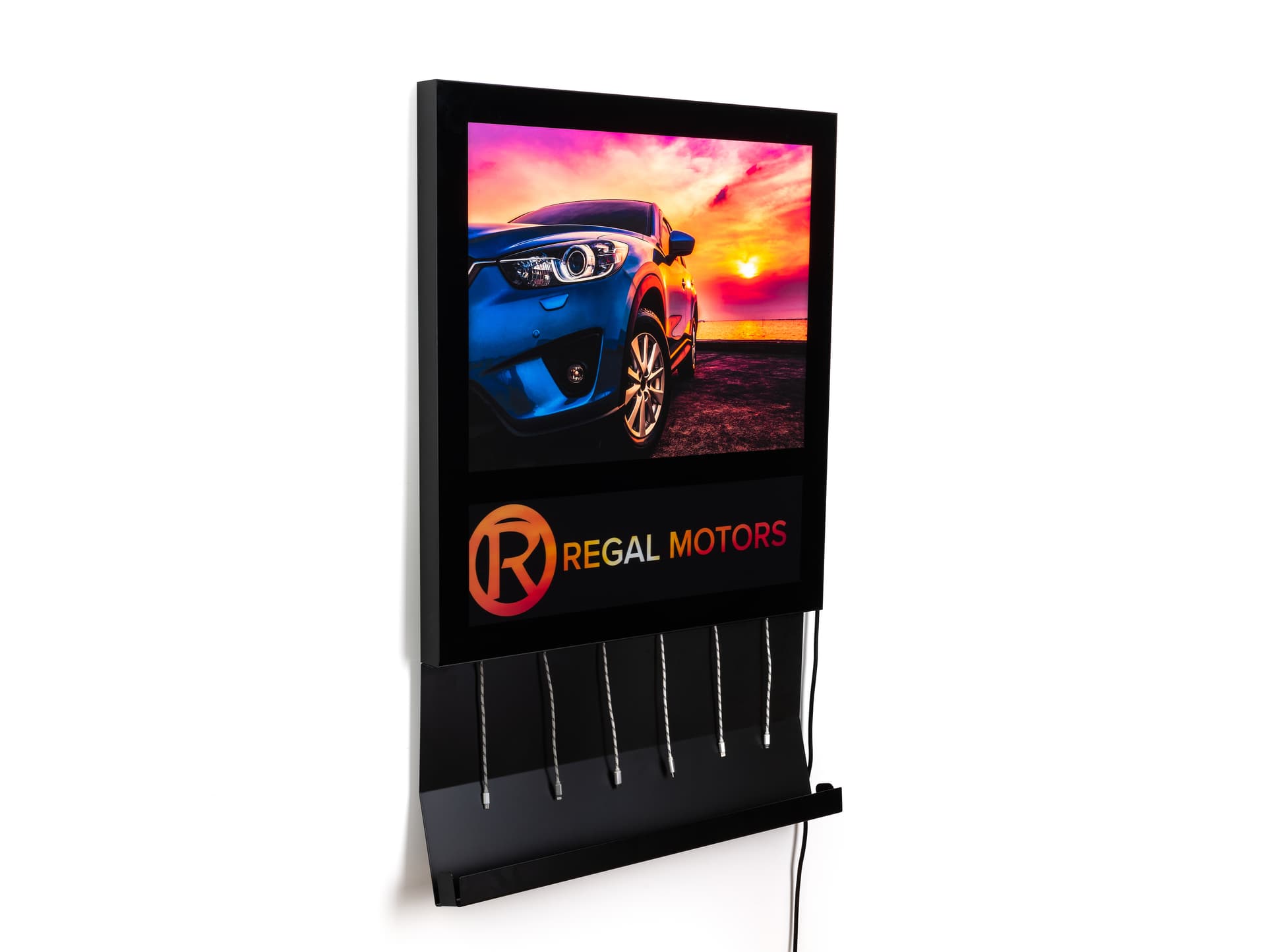 Black wall light box charging station with six device cables