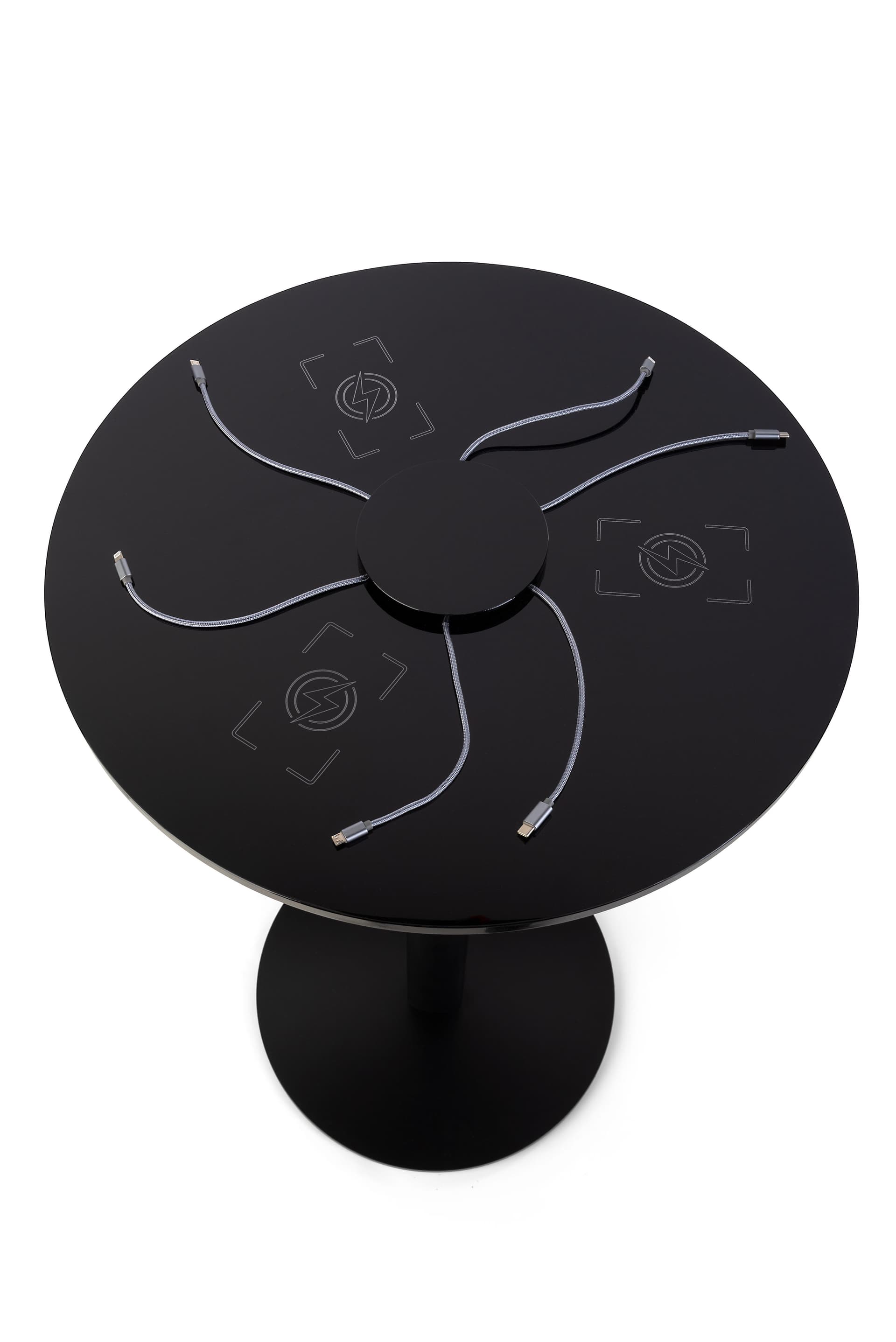Black Qi wireless table charging station with Micro-USB, Apple Lightning, and Type-C Cables