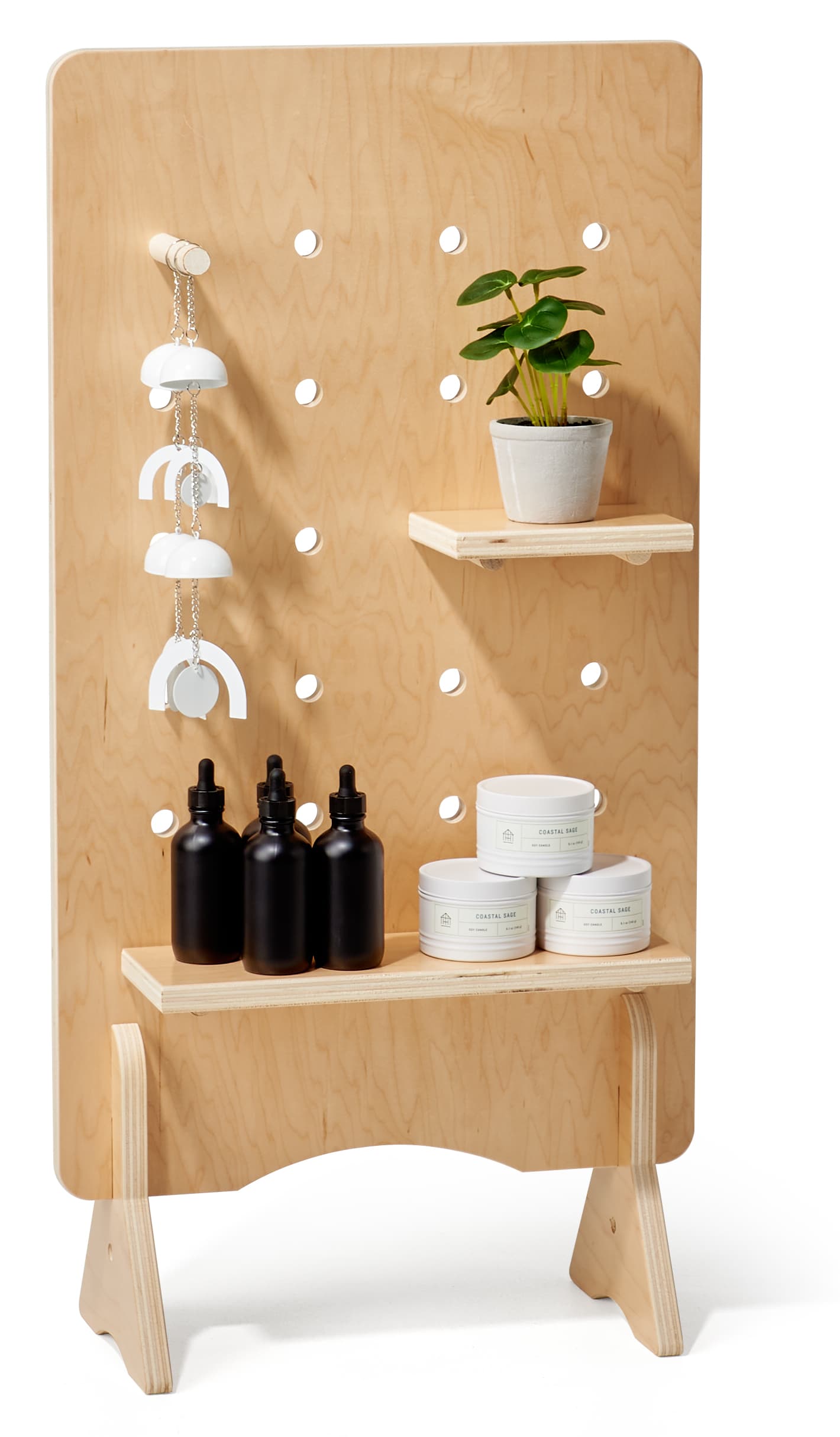 Wooden pegboard with shelves and natural wood finish 