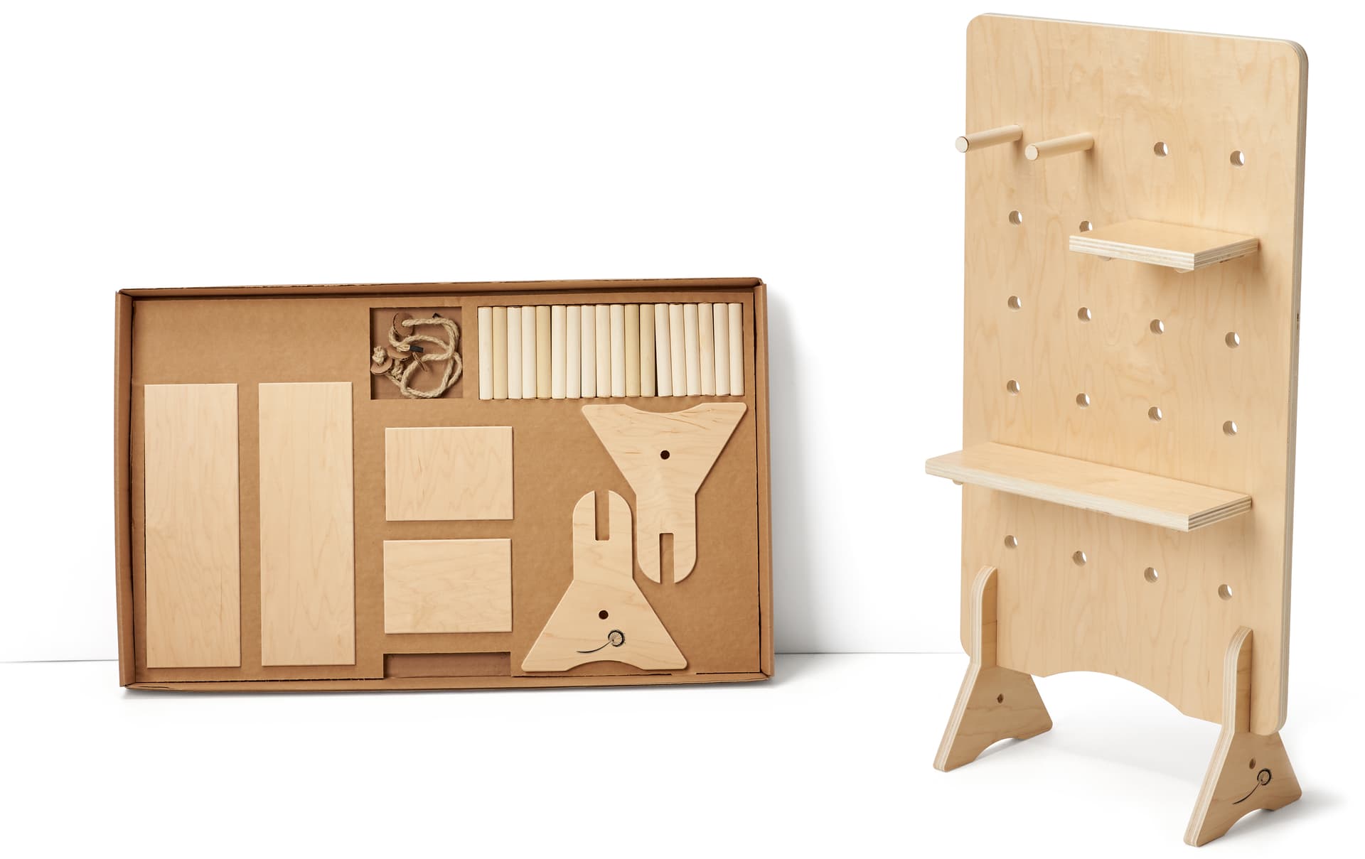 Wooden pegboard with shelves and recyclable carrying case  