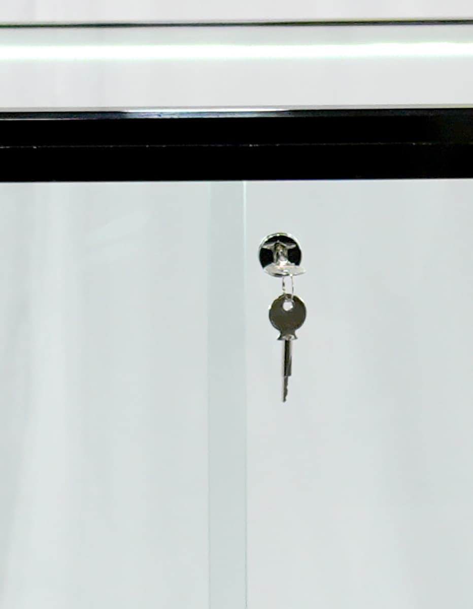 Illuminated display case​ with locking and sliding glass door