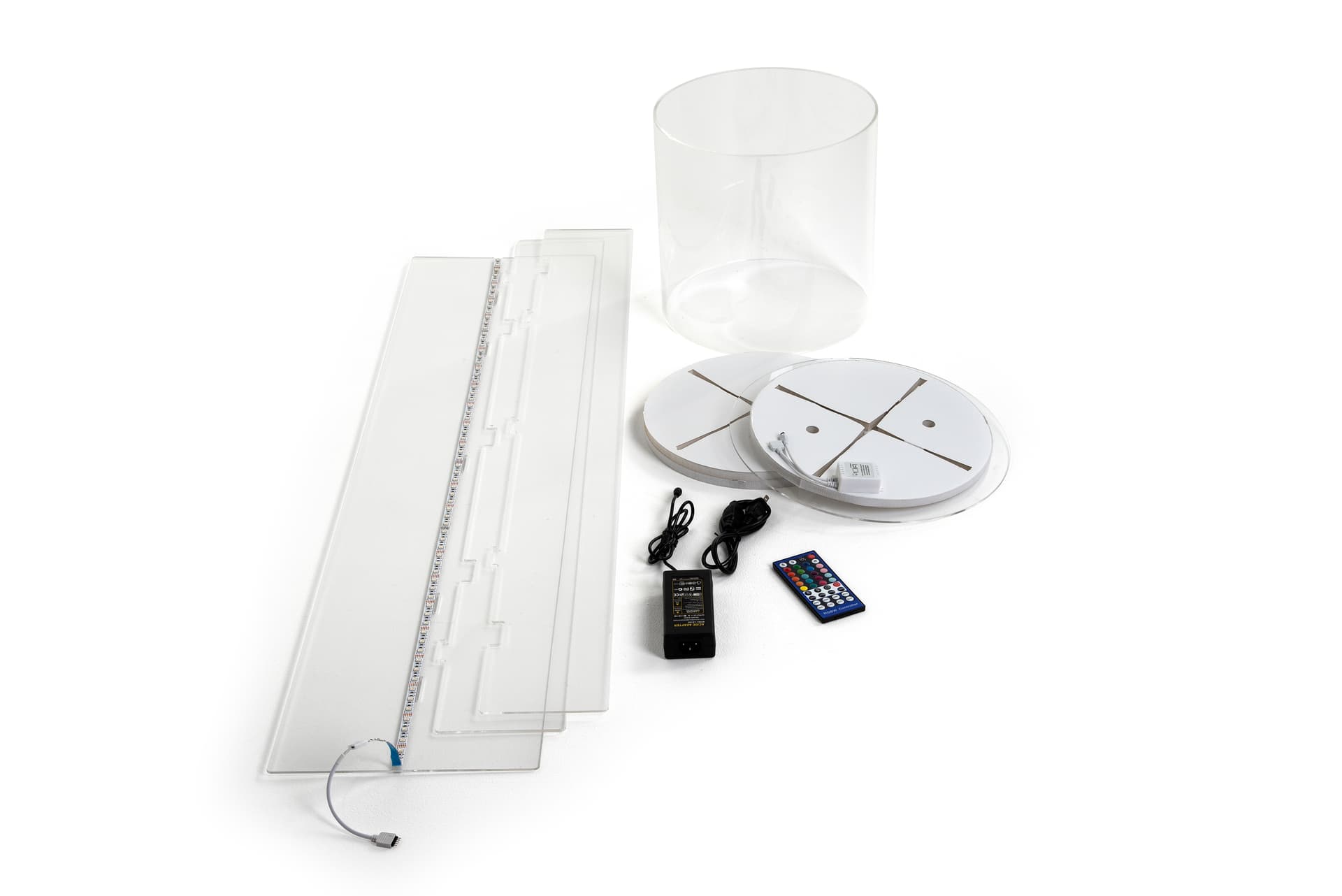 Round pedestal display case with remote control lighting
