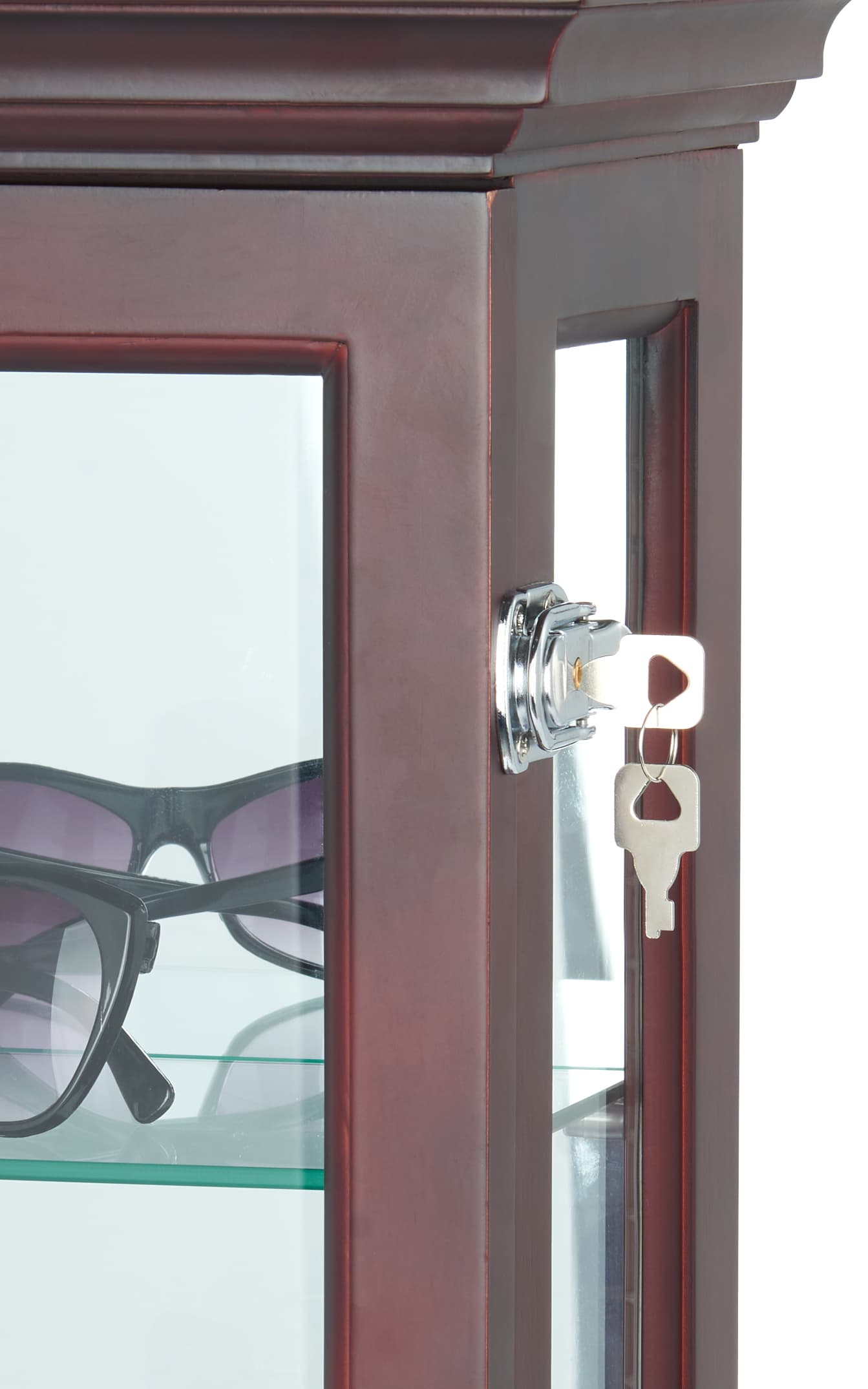 Mirrored curio cabinet with locking keys