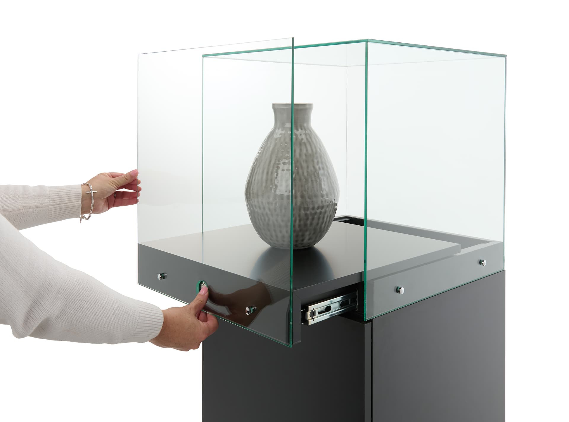 Glass-top pedestal display case with slide out display area with a 30lb weight capacity