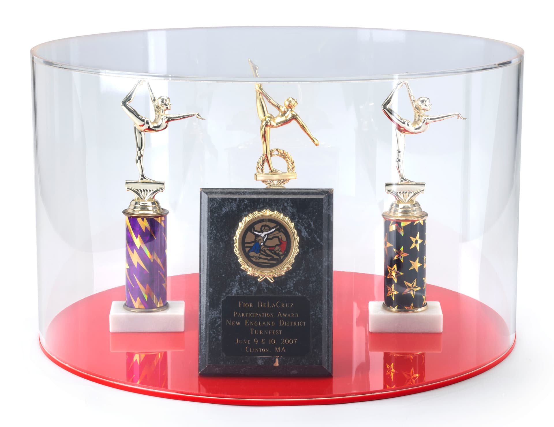 Round red display case with 20" x 12" dimensions