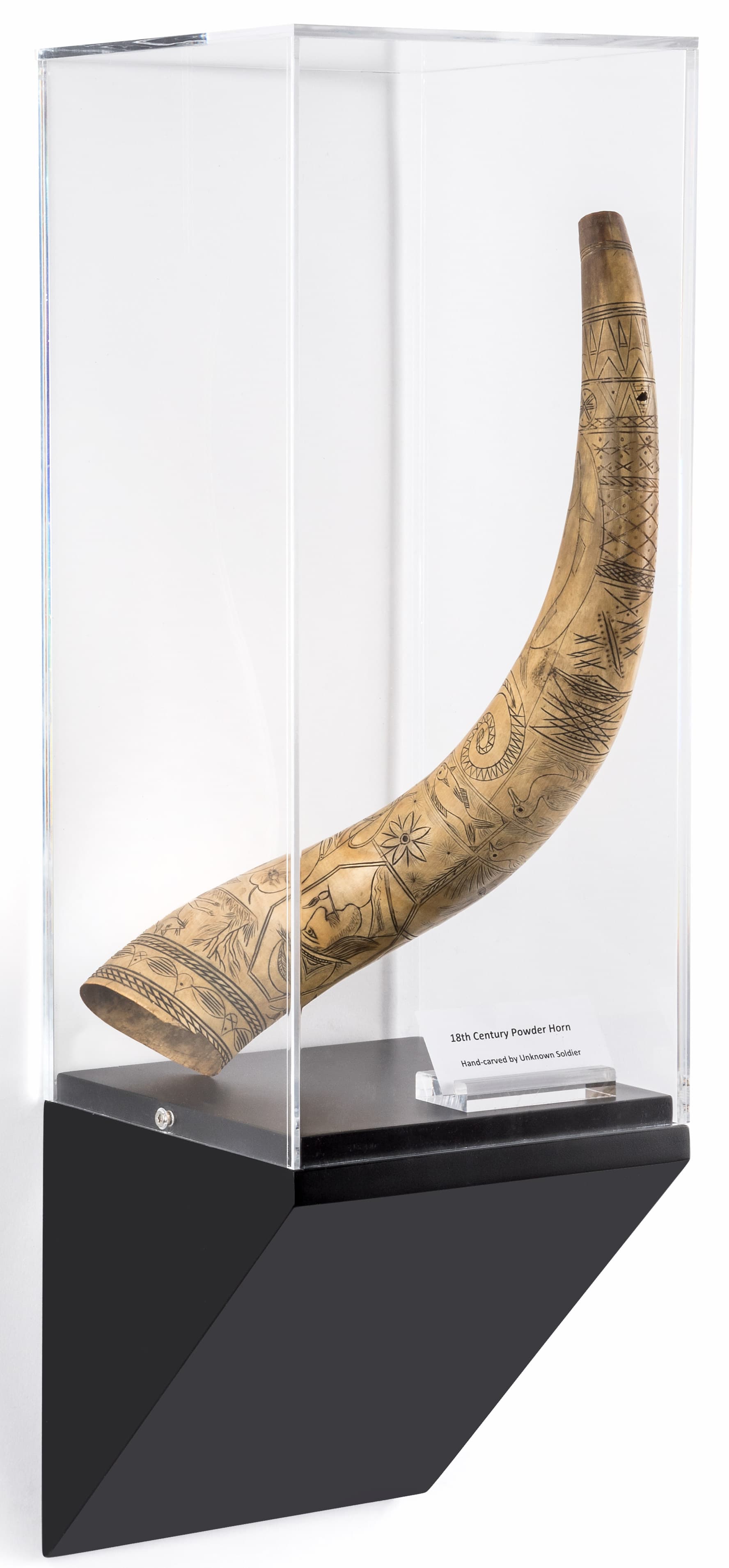 Wedge pedestal gallery wall display showcasing a piece owned by a private collector