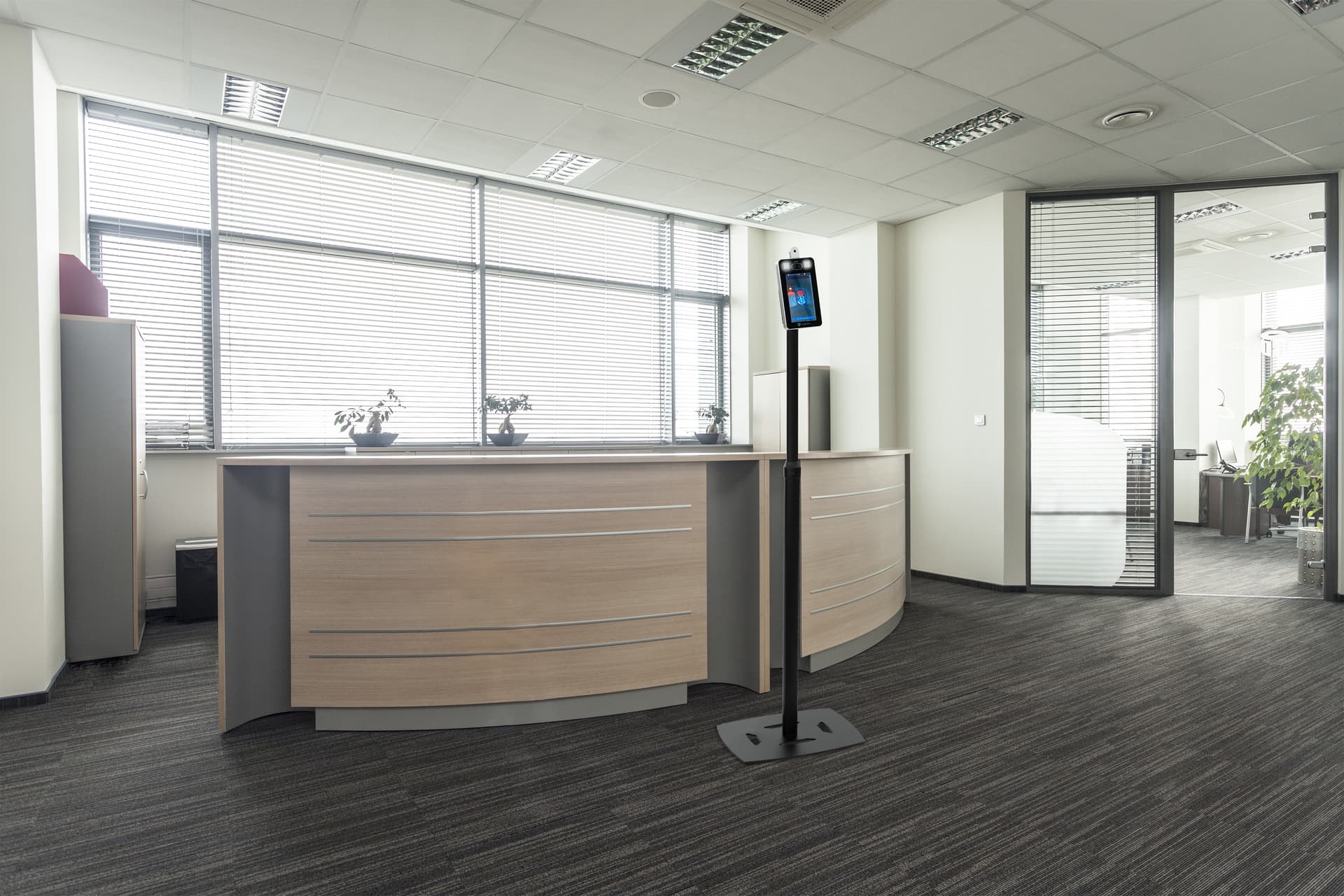 Floor standing adjustable height temperature kiosk