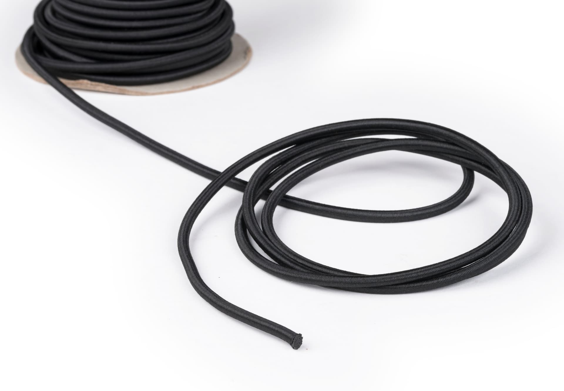 Included Elastic Rope in the 8-Barrier Black Gallery Stanchion System