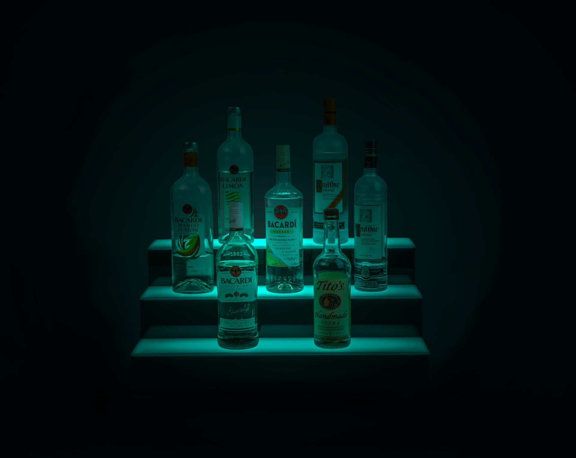 lighted bottle display with gentle colored glow