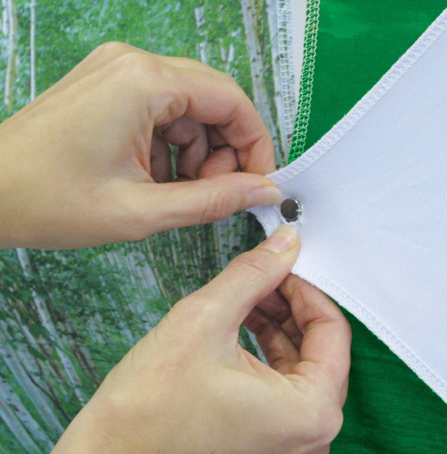 Pop up displays with button fabric graphics