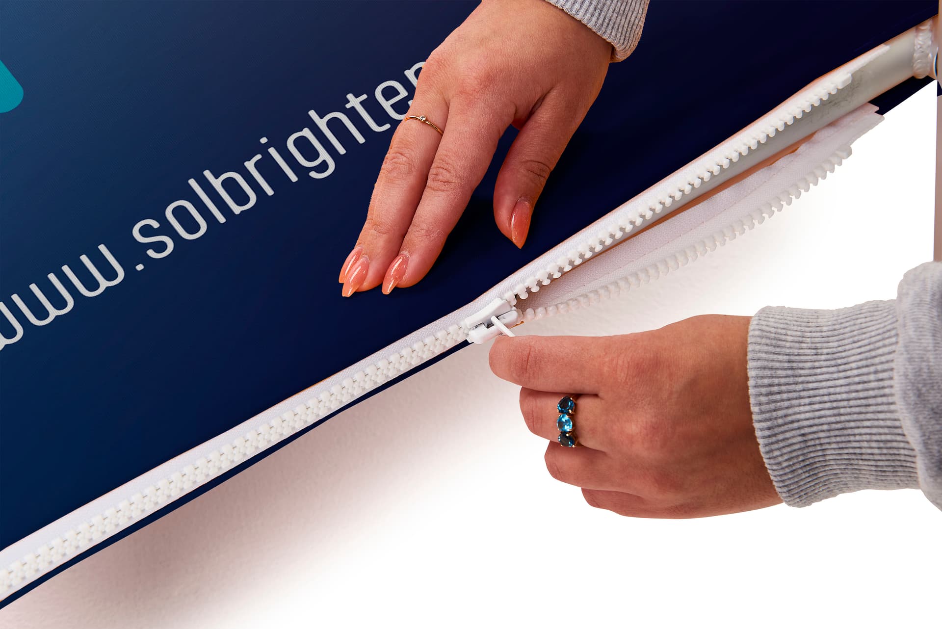 Personalized slip top banner stand with zipper closure 