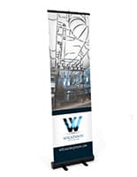 Budget narrow base retractable banner stand with floor standing placement