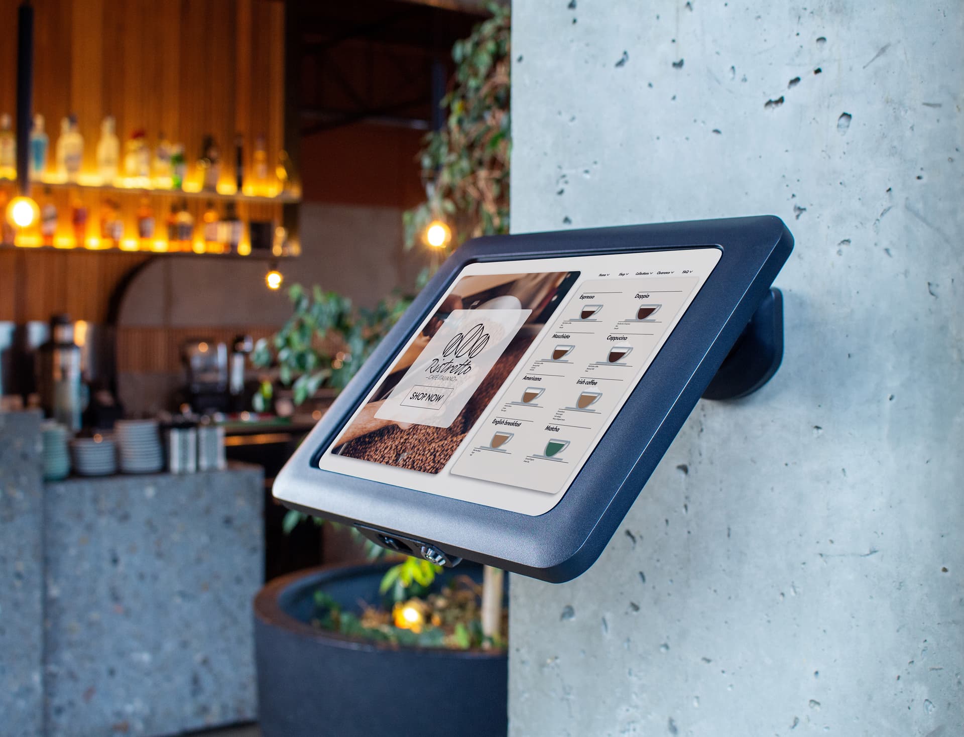 Desktop iPad holder showcasing the unit being mounted to a wall in a restaurant 