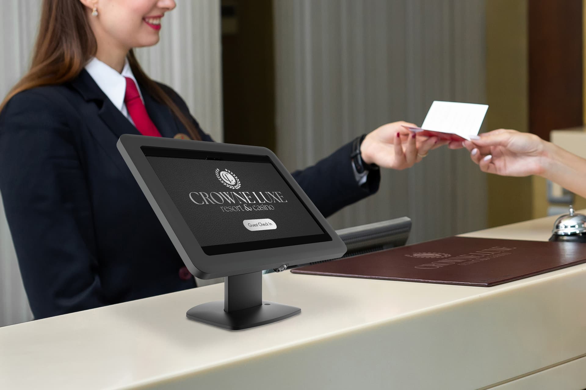 Countertop Samsung Galaxy tablet holder being used in a hotel lobby for check in