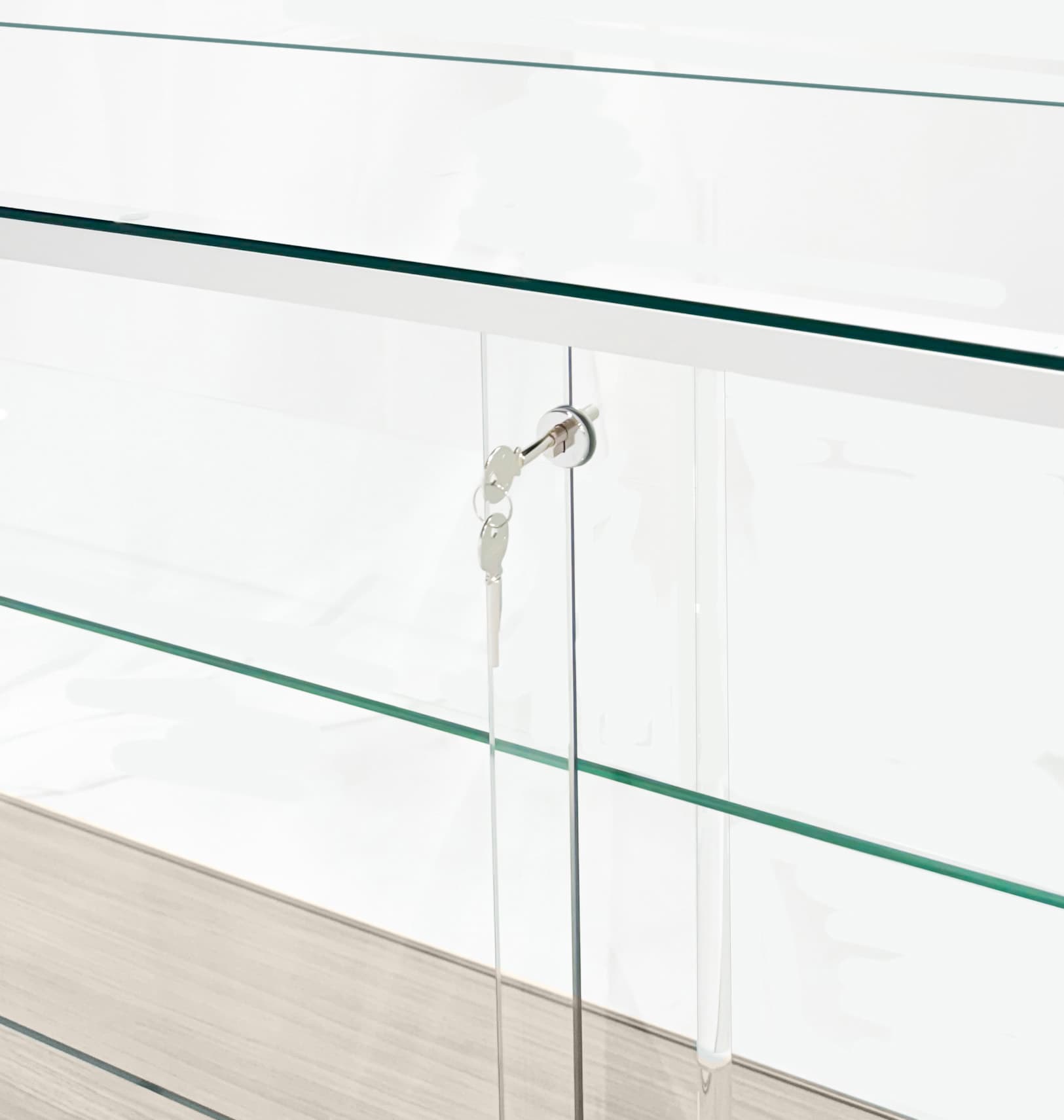 Glass display counter with locking display area