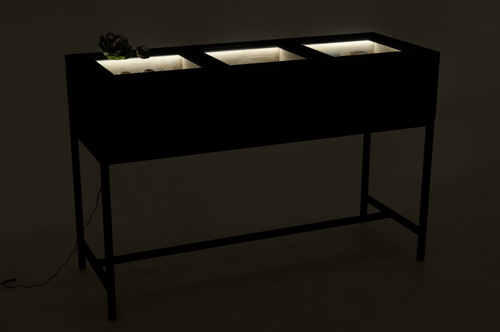 Glass top retail console table with adjustable lighting