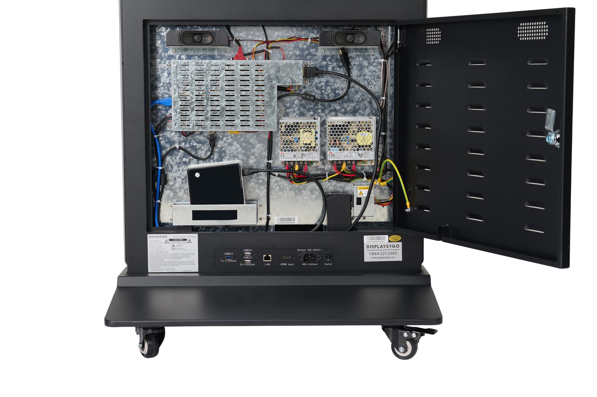 Digital display advertising floor stand with media player holder in the maintenance bay
