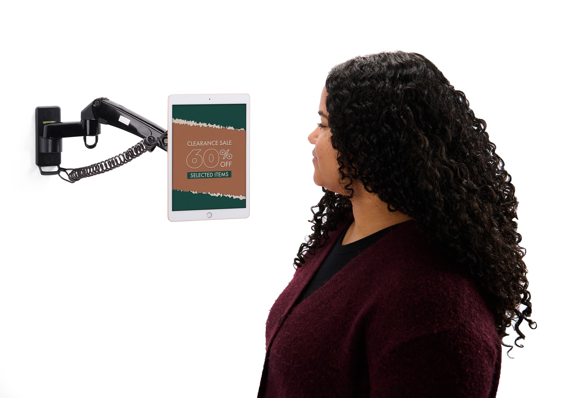 Articulating arm tablet mount with coiled cable lock 