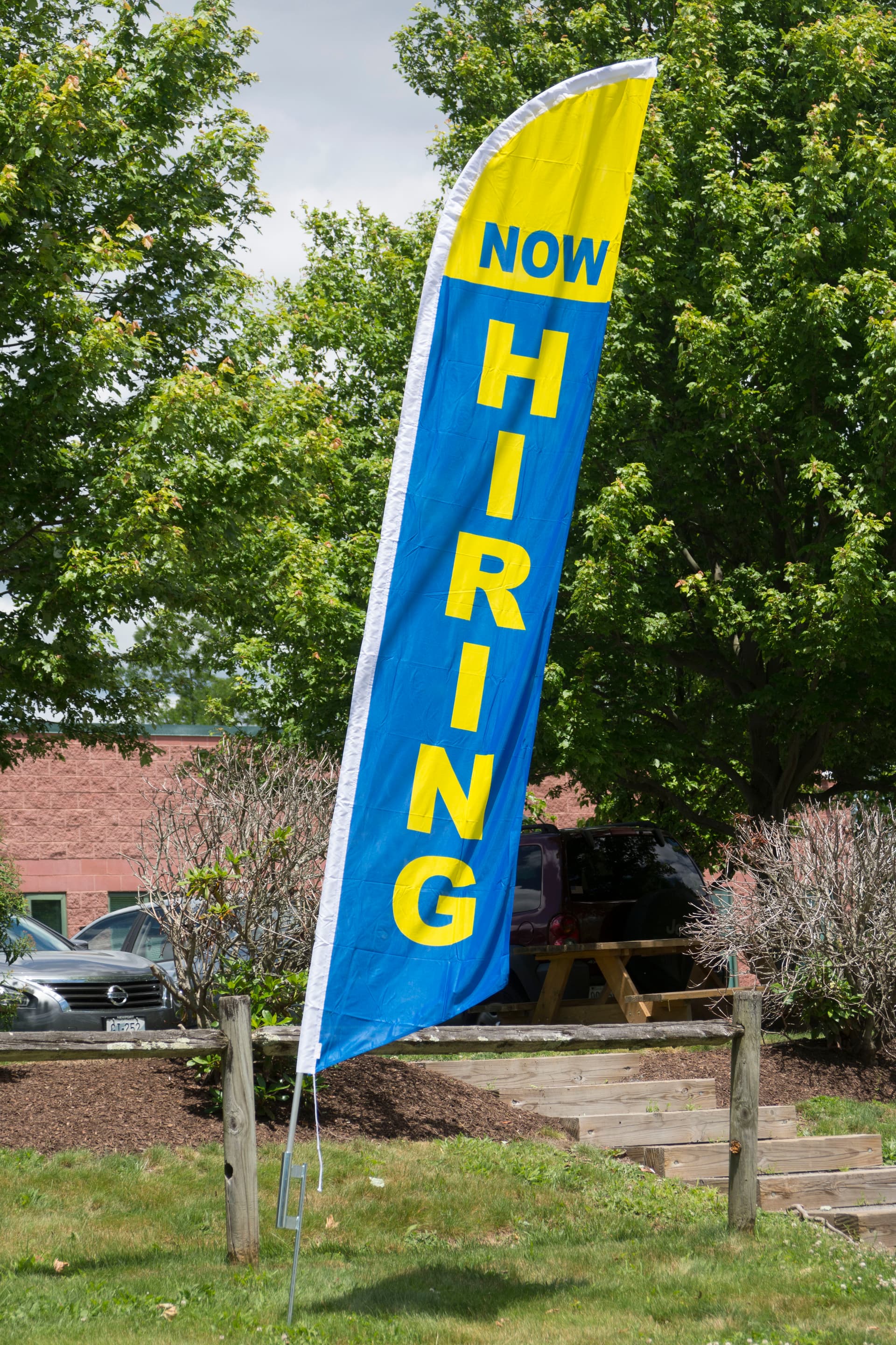Now Hiring Flag with Ground Spike