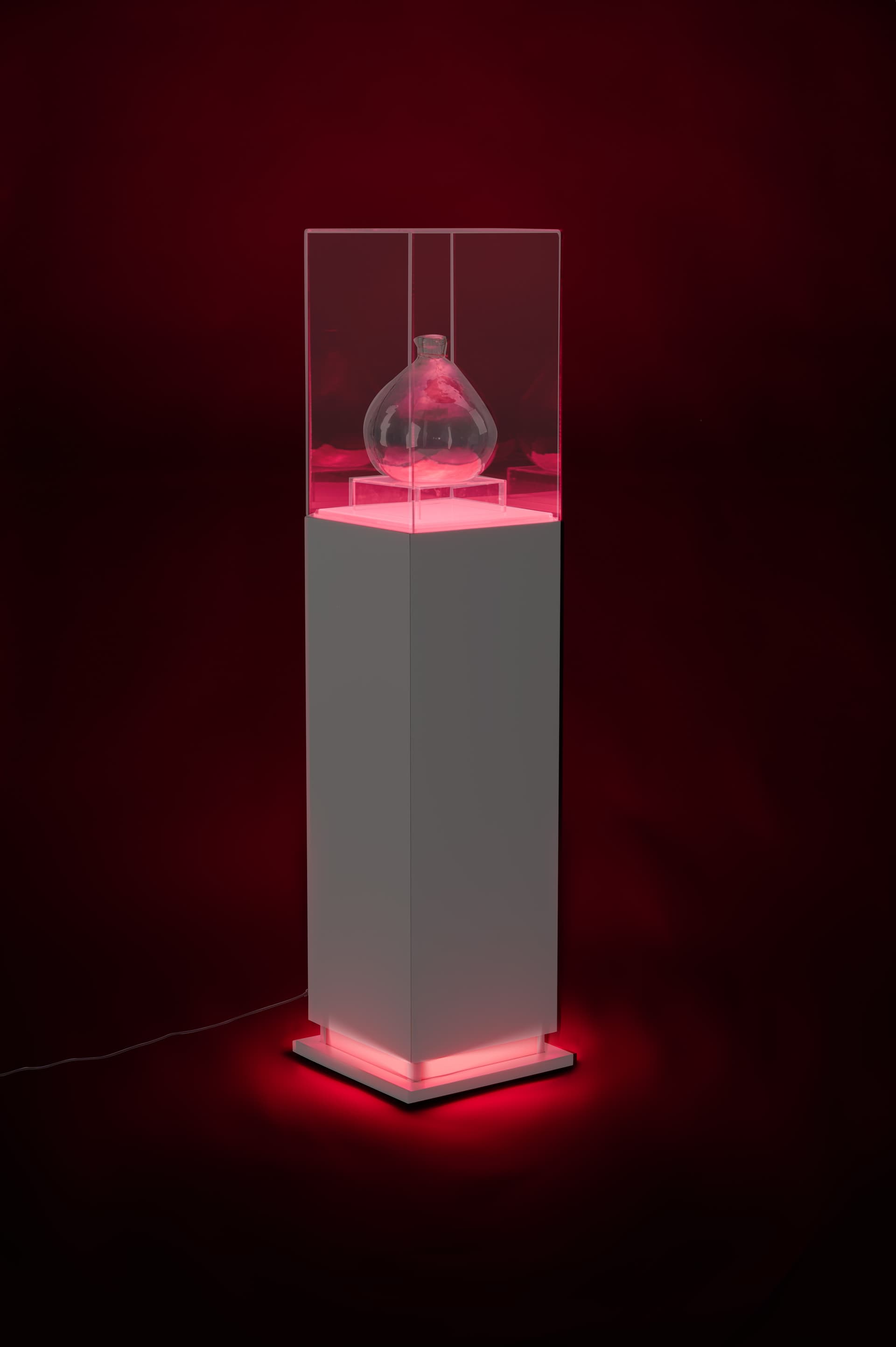 Pedestal display case with acrylic cover and eco-friendly build
