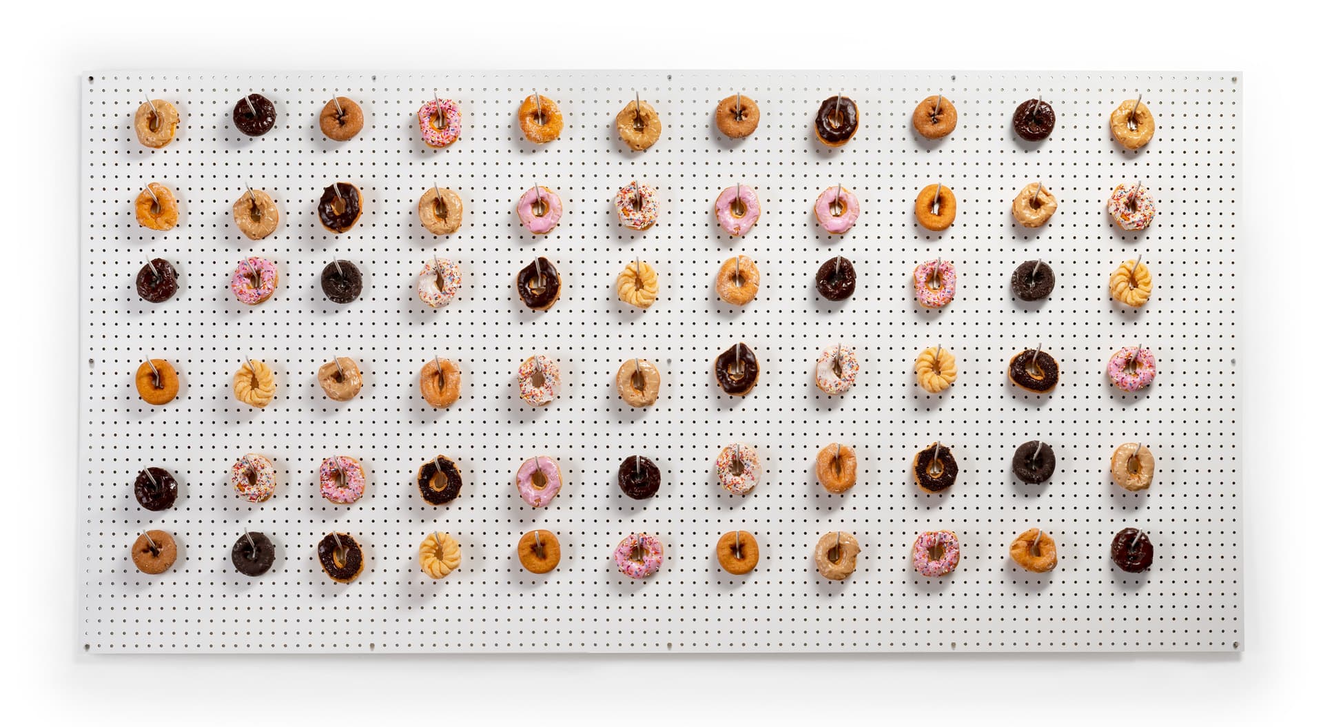 Large white pegboard with melamine finish
