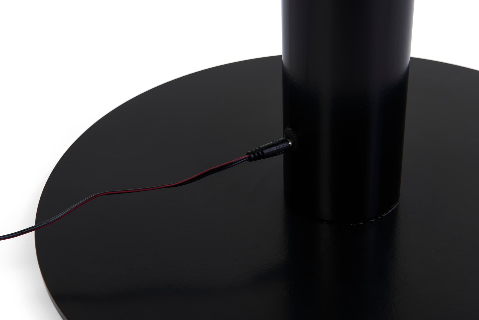 Stanchion with LED sign holder includes a charger 