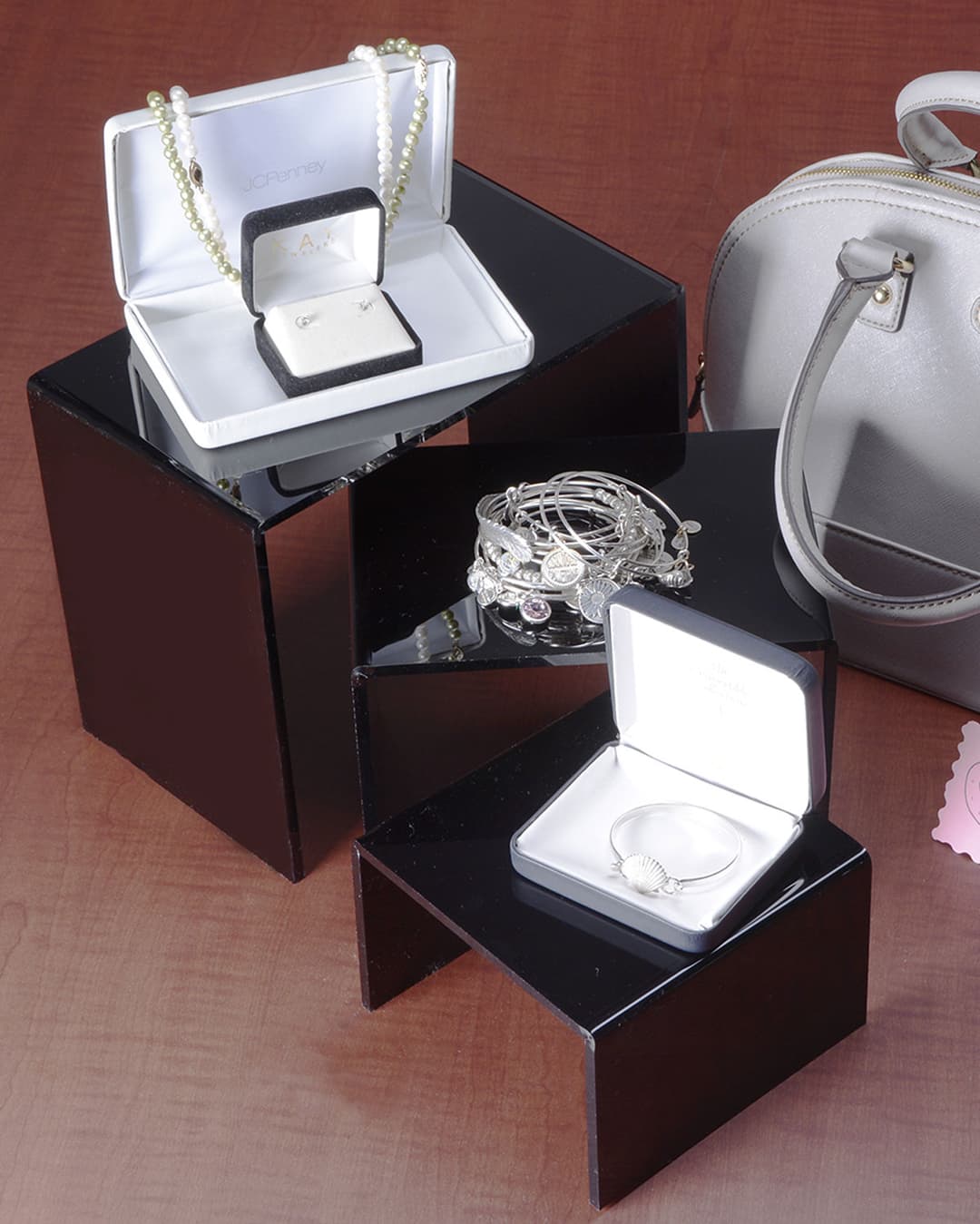 Showcase Riser | Retail Presentation Stand | Displays2Go