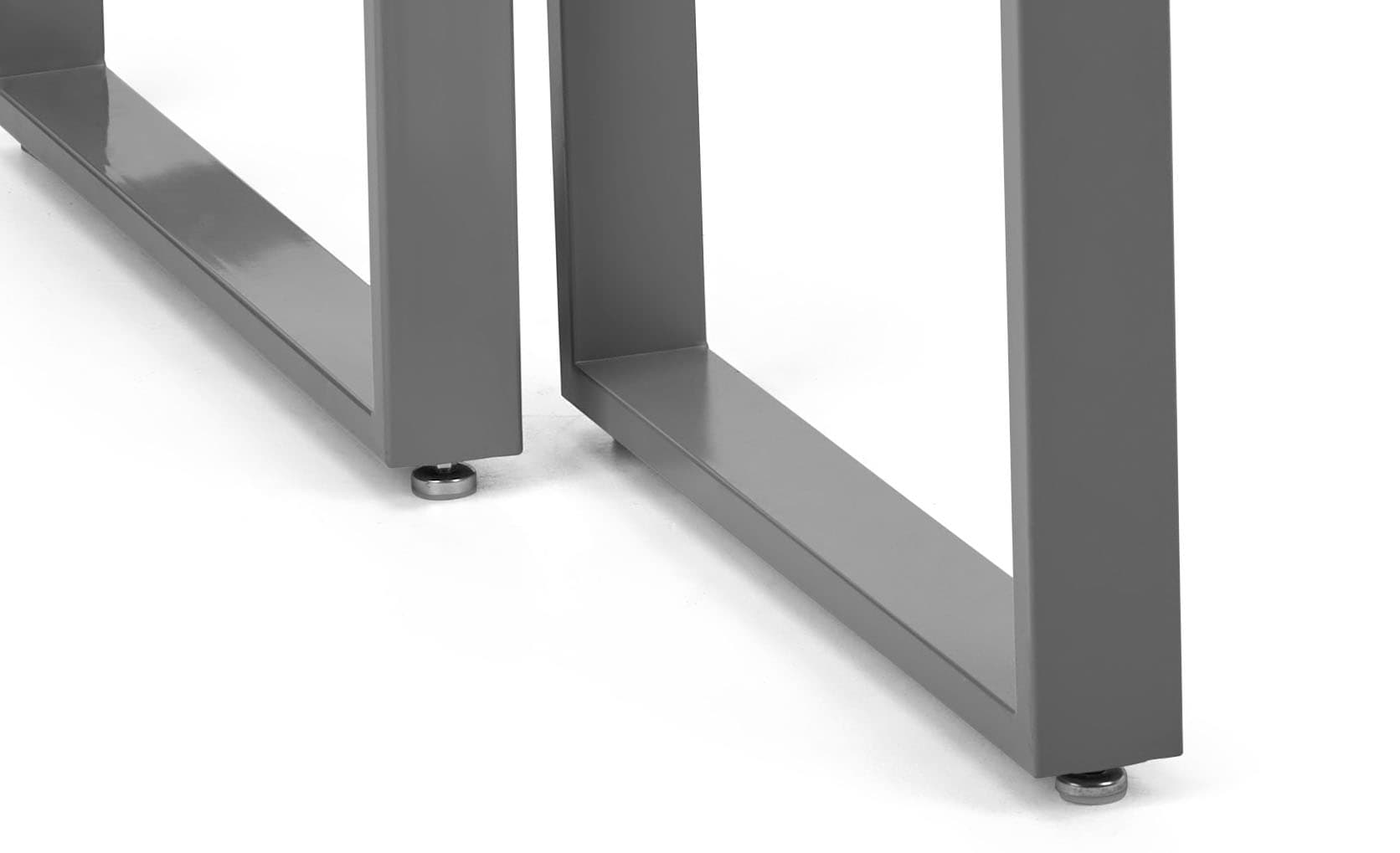 Modern nesting tables with adjustable foot levels