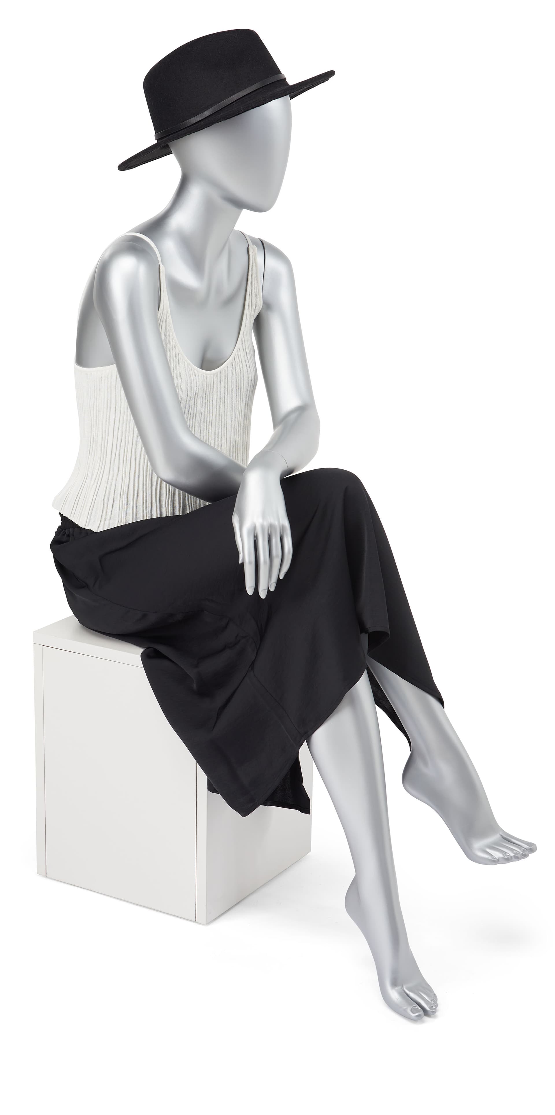 Abstract seated female mannequin with removable arms and torso 