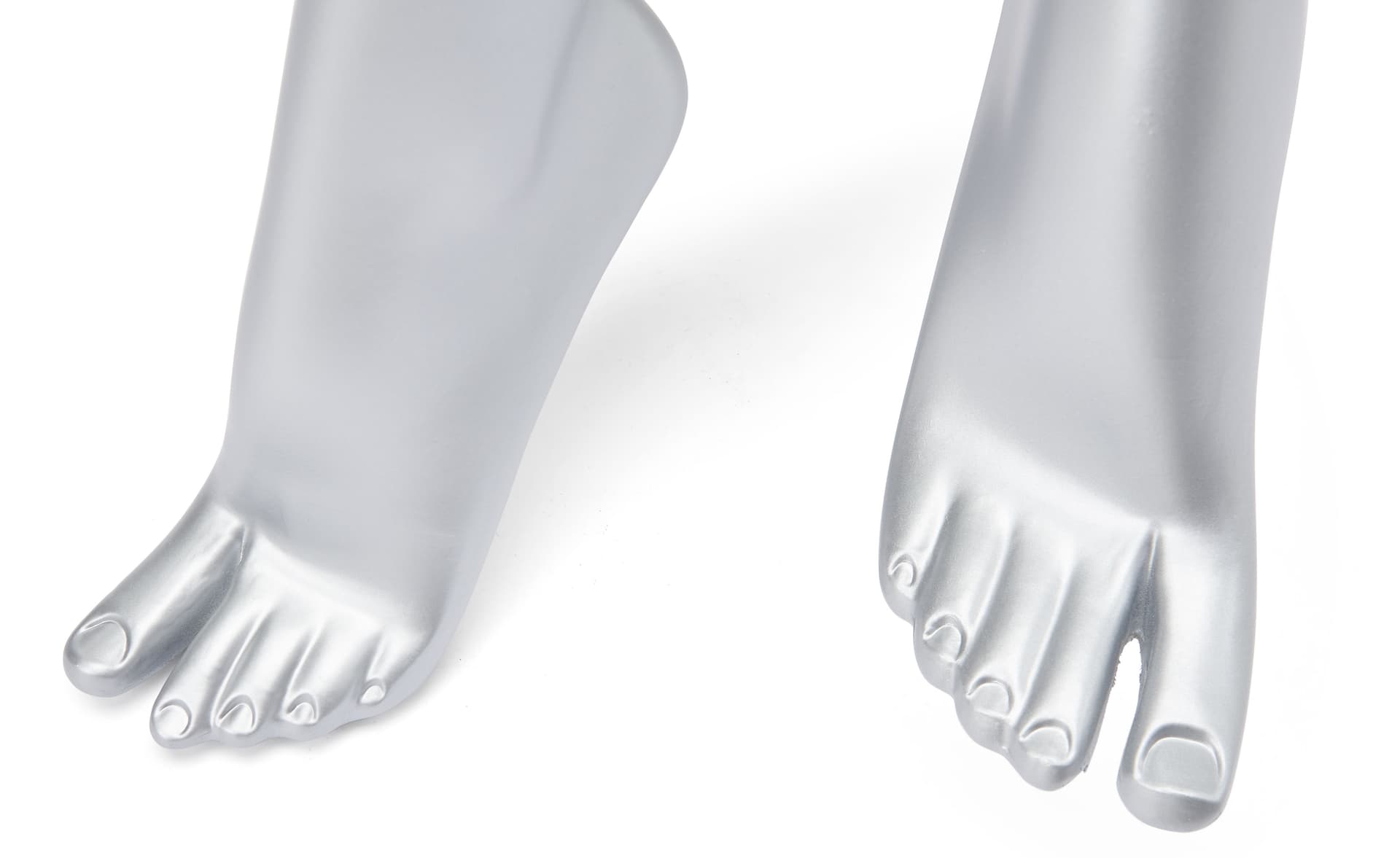 Abstract seated female mannequin with fully formed hands and feet 