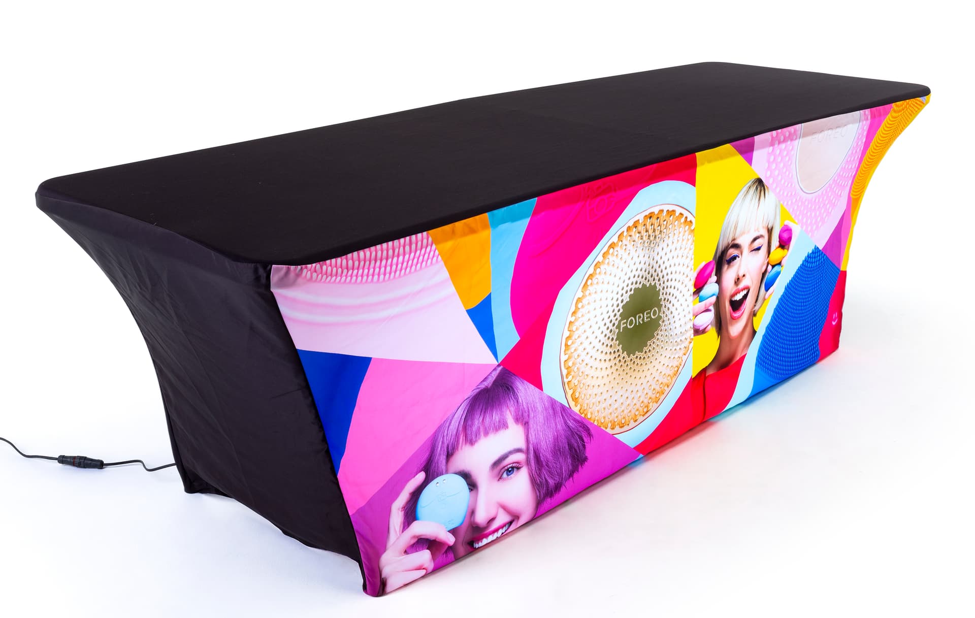 Black stretch top and back on 8' event table package with custom spandex cover and LED light kit