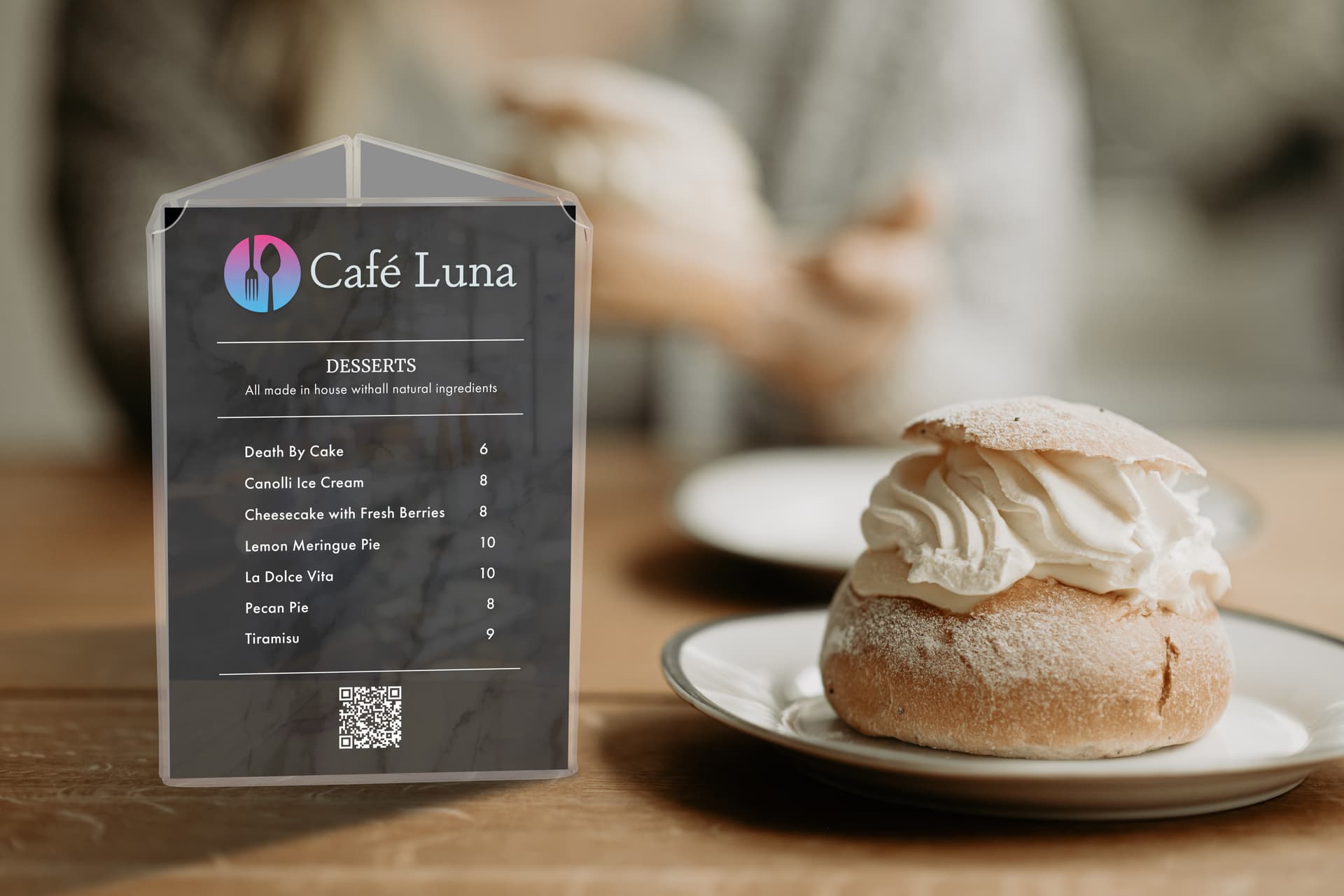 Plastic sign holder in cafe with dessert menu