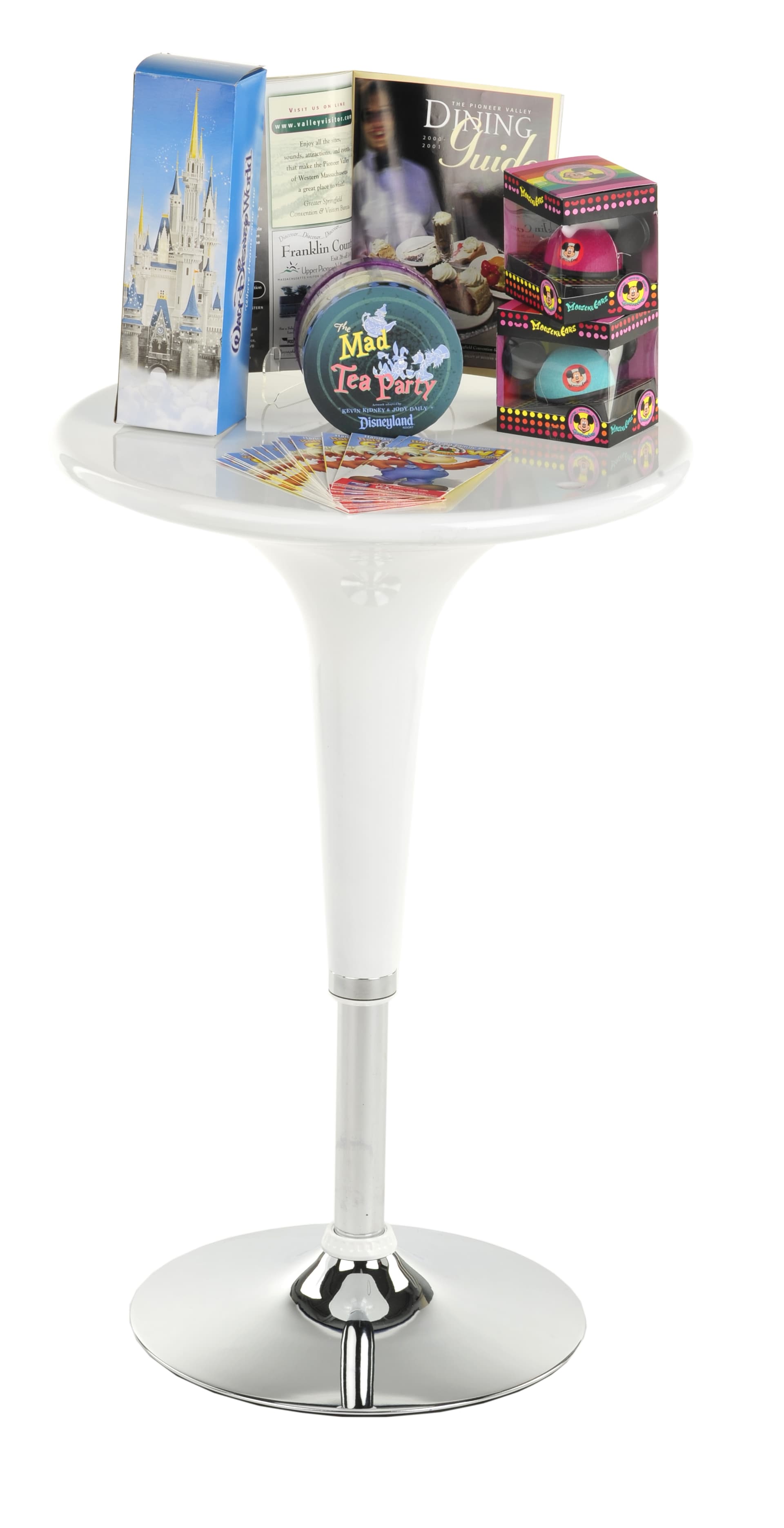 White Trade Show Table and Chairs Showcasing Merchandise