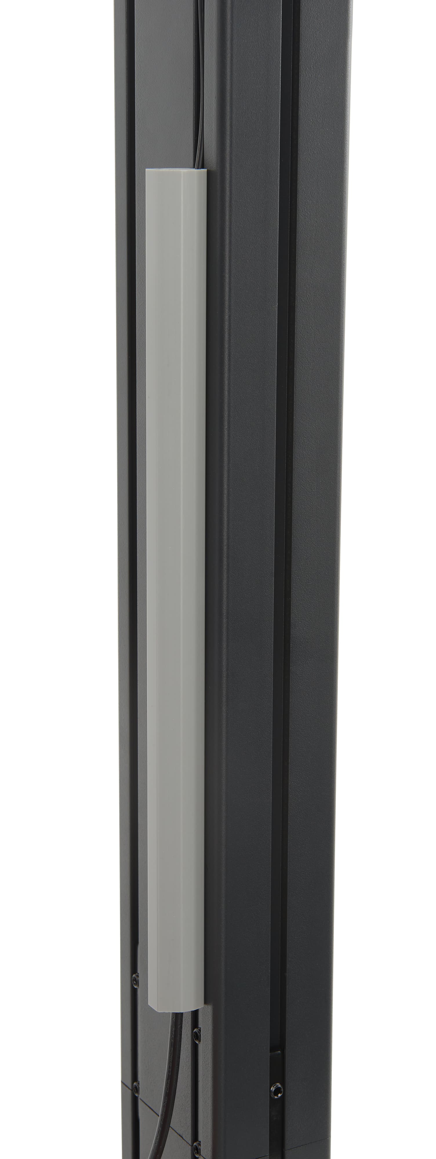 This mobile tv stand has a gray cable management system
