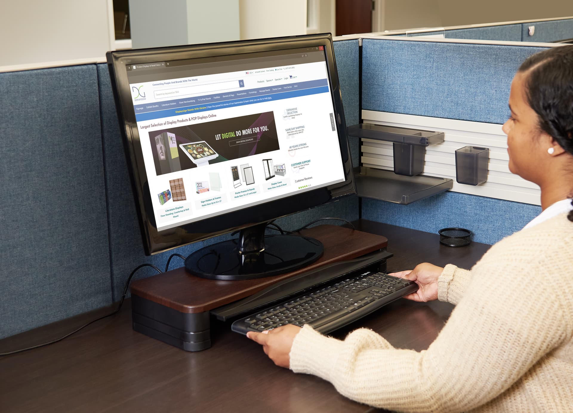 Disinfecting monitor stand for sanitizing keyboard and mouse