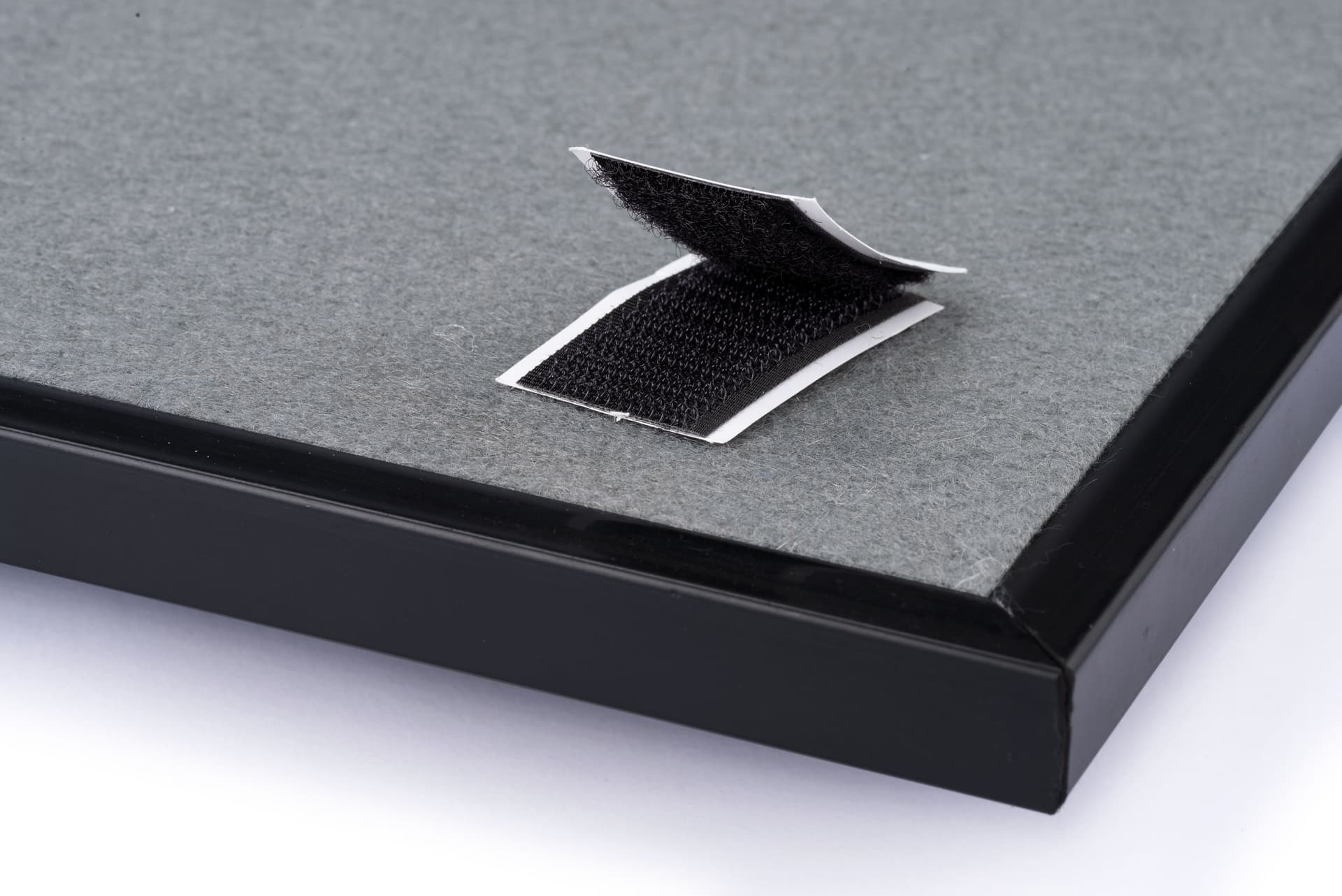 Hook and loop strips with plastic adhesive films