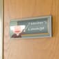 Curved Adhesive Wall Sign Holder, Snap-Out Lens