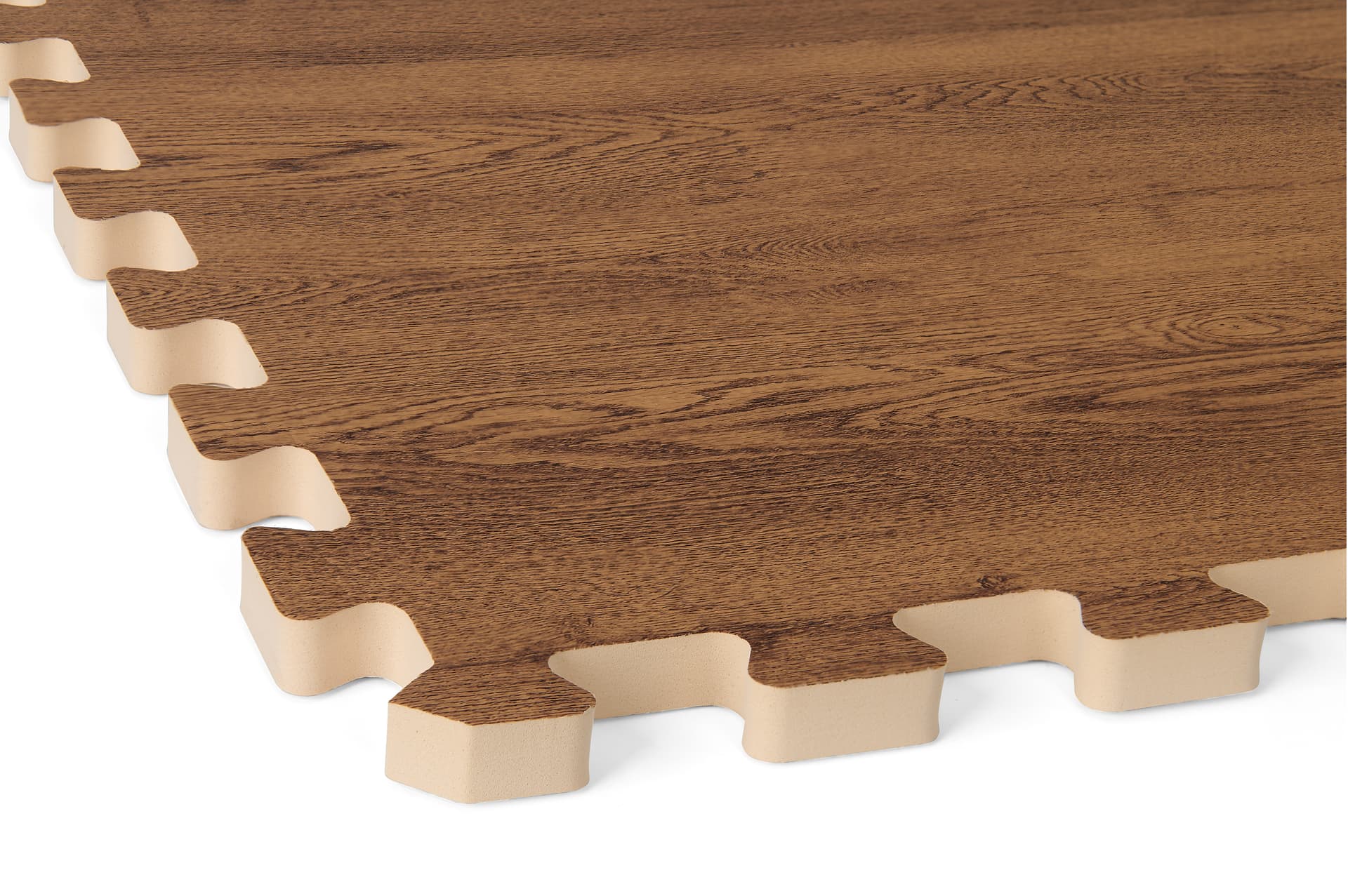 Foam wood floor tiles showing a close up of one of the 5/8 inch thick tile