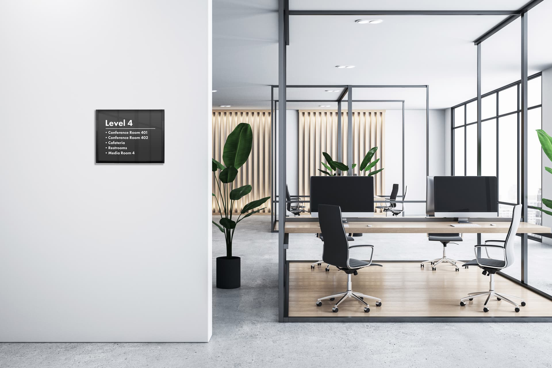 Sign holder mounted to the wall in an office setting