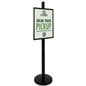 Sign display with black pole and base