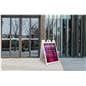 Outdoor signs for cafes, restaurants, concert venues, and parking lots