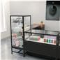Glass showcase tower in retail environment