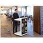 Checkout stand with digital display sold being utilized in a restaurant environment as a hostess stand