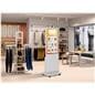 Advertising Multimedia Kiosk being utilized in a retail clothing store