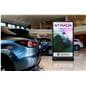 Digital display advertising floor stand showcasing the unit in a car showroom playing a video of a car advertisement