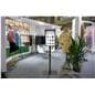 Commercial touch screen display being utilized in a retail trade show to display a clothing companies website