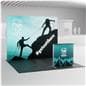 10' backlit trade show display with counter in a room with trade show flooring